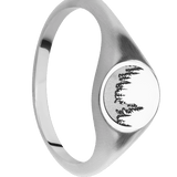 Small Circle signet ring (10mm) in 14K White Gold, with a Thin style band and a Trees engraving.