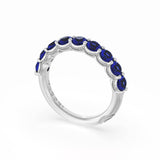 round-cut-blue-sapphire-eternity-band-in-18kt-white-gold-415w65bs12