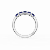 Round Cut Blue Sapphire Eternity Band in 18kt White Gold