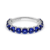Round Cut Blue Sapphire Eternity Band in 18kt White Gold