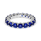 Round Cut Blue Sapphire Eternity Band in Platinum
