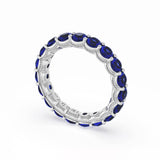 Round Cut Blue Sapphire Eternity Band in Platinum