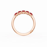 Round Cut Ruby Eternity Band in 18kt Rose Gold