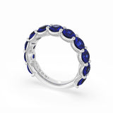 round-cut-blue-sapphire-eternity-band-in-18kt-white-gold-416w65bs34