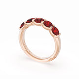 Round Cut Ruby Eternity Band in 18kt Rose Gold