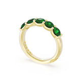 Round Cut Emerald Eternity Band in 18kt Yellow Gold