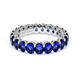 Oval Cut Blue Sapphire Eternity Band in 18kt White Gold