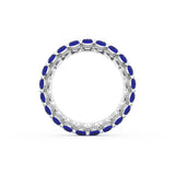 Oval Cut Blue Sapphire Eternity Band in 18kt White Gold