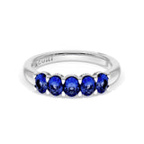Oval Cut Blue Sapphire Eternity Band in 18kt White Gold