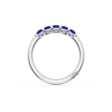 Oval Cut Blue Sapphire Eternity Band in 18kt White Gold