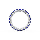 Oval Cut Blue Sapphire Eternity Band in Platinum