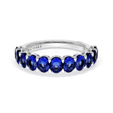 Oval Cut Blue Sapphire Eternity Band in Platinum
