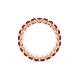 Oval Cut Ruby Eternity Band in 18kt Rose Gold