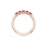 Oval Cut Ruby Eternity Band in 18kt Rose Gold