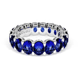 Oval Cut Blue Sapphire Eternity Band in 18kt White Gold