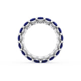 Oval Cut Blue Sapphire Eternity Band in 18kt White Gold