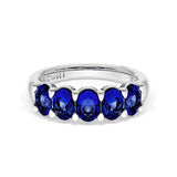 Oval Cut Blue Sapphire Eternity Band in 18kt White Gold