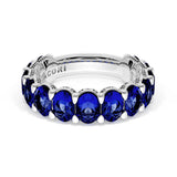 Oval Cut Blue Sapphire Eternity Band in 18kt White Gold