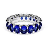 Oval Cut Blue Sapphire Eternity Band in Platinum