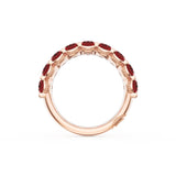 Oval Cut Ruby Eternity Band in 18kt Rose Gold