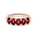Oval Cut Ruby Eternity Band in 18kt Rose Gold