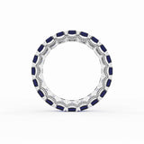 Emerald Cut Blue Sapphire Eternity Band in Platinum