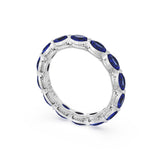 Blue Sapphire Eternity Band in Platinum