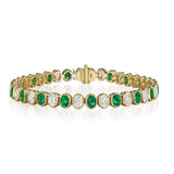 bezel-set-emerald-&-diamond-tennis-bracelet-in-18kt-yellow-gold-fb694demy7