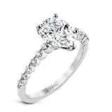 Pear-cut Engagement Ring & Matching Wedding Band in 18k Gold with Diamonds