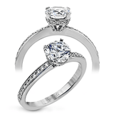 Round-cut Hidden Halo Engagement Ring in 18k Gold with Diamonds