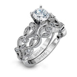 Round-cut Trellis Engagement Ring & Matching Wedding Band in 18k Gold with Diamonds