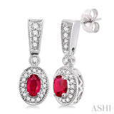 5x3MM Oval Cut Ruby and 1/3 Ctw Round Cut Diamond Earrings in 14K White Gold