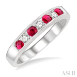 1/5 Ctw Channel Set Round Cut Diamond and 2.5 MM Round Cut Ruby Band in 14K White Gold