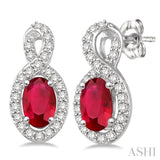 5x3 MM Oval Cut Ruby and 1/5 Ctw Round Cut Diamond Earrings in 14K White Gold