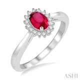 6X4MM Oval Cut Ruby Center and 1/8 Ctw Round Cut Diamond Halo Precious Stone Ring in 10K White Gold