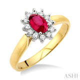 6x4MM Oval Cut Ruby and 1/5 Ctw Round Cut Diamond Ring in 14K Yellow Gold