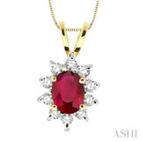 7x5MM Oval Cut Ruby and 1/3 Ctw Round Cut Diamond Pendant in 14K Yellow Gold with Chain