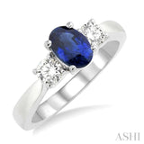 7X5mm Oval Shape Sapphire and 1/2 Ctw Round Cut Diamond Ring in 14K White Gold