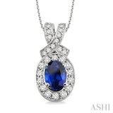 7x5mm Oval Cut Sapphire and 5/8 Ctw Round Cut Diamond Pendant in 14K White Gold with chain
