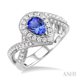 7x5mm Pear Shape Tanzanite and 3/4 Ctw Round Cut Diamond Ring in 14K White Gold