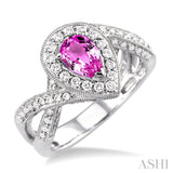 7x5mm Pear Shape Pink Sapphire and 3/4 Ctw Round Cut Diamond Ring in 14K White Gold